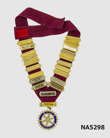 Maroon fabric neck 'chain' with metal badges attached.