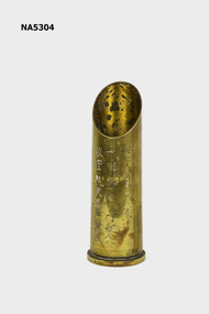 Brass shell casing.
