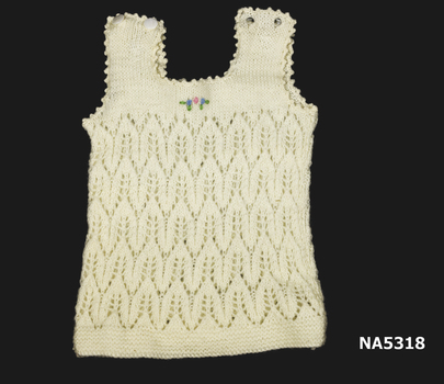 Handknitted woollen baby singlet