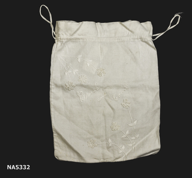 A cotton toilet bag.