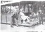 Fels Family having a picnic in Wattle Park sitting on a tram.