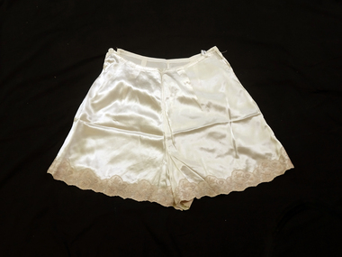 Knickers with appliqued coffee lace encircling each leg