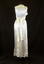 The nightgown is long with a coffee coloured lace . 