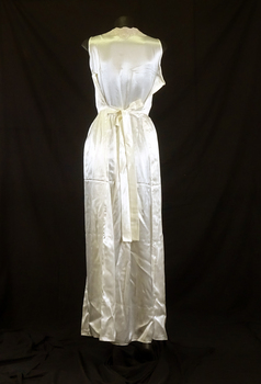 The nightgown is long with a coffee coloured lace . 