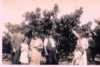 William Moffatt ,  Orchardist standing in the middle wearing a waistcoat