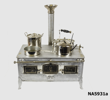 Child's stove - with utensils put on