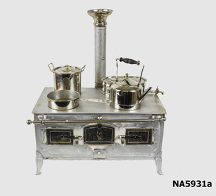 Child's stove - with utensils put on