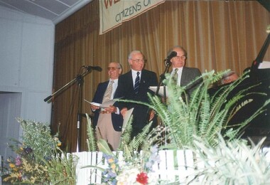Photograph, 3 Men on Stage