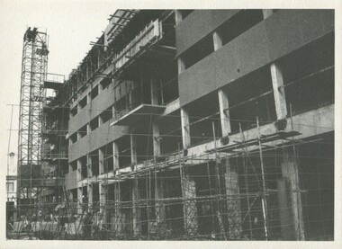 A partially constructed building with scaffolding around it