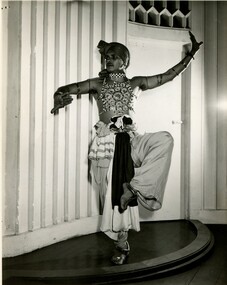 A student dressed in a sarong