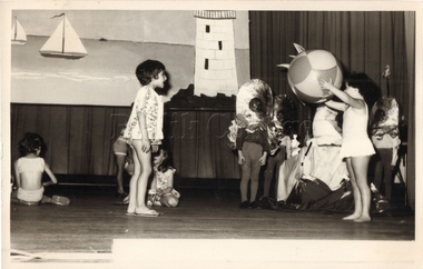Photograph - Students performing a beach scene on stage, 1960s, 1960s