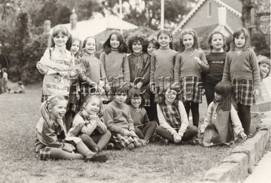 Photograph (Item) - Students outdoors, some in art smocks, c. 1980s