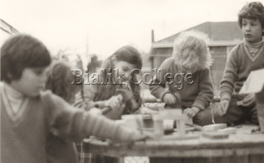 Photograph (Item) - Students doing an outdoor building activity, c. 1980s