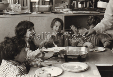Photograph (Item) - Students having a cooking lesson, c. 1980s