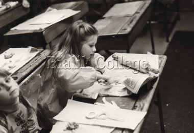 Photograph (Item) - Student doing an art activity, c. 1980s