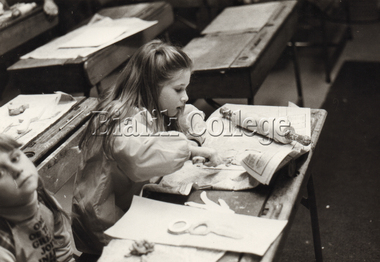 Photograph (Item) - Student doing an art activity, c. 1980s, c. 1980s
