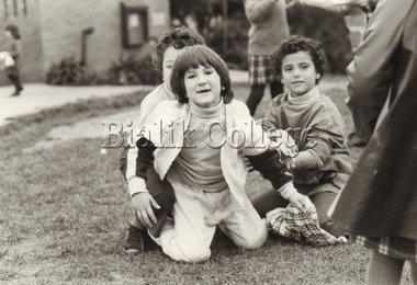 Photograph (Item) - Students playing outside, c. 1980s