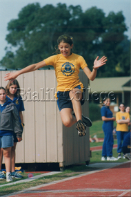 Photograph, Student competing in the long jump at a House Sports Day, c. 2000s