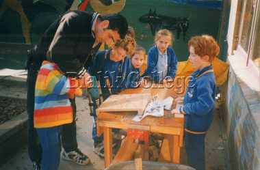 Photograph, Students doing an outside building activity c. 1990s, c. 1990s