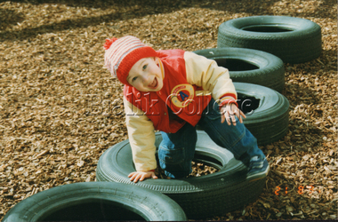 Photograph (Item) - A student from Kinder class 3A playing outside, c. 1990s, c. 1990s