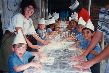 Photograph (item) - Students and teachers rolling matzah for Pesach, 1989
