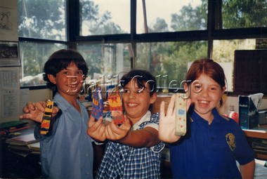 Photograph (item) - Students with hand-made mezuzah cases, 1998