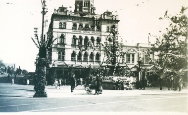 Photograph, National Mutual Building and Burke & Wills Monument decorated for the Ballarat Centenary 1938