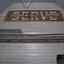 Sign inside a weatherboard church