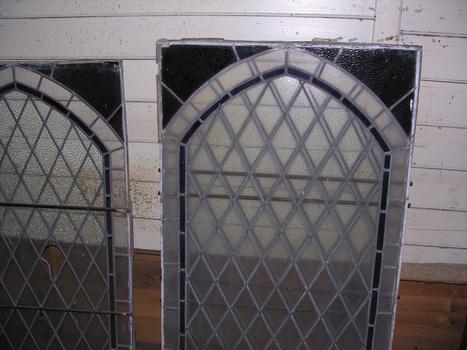 Windows inside a weatherboard church