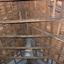 A timber roof inside a weatherboard church