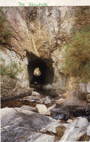 A tunnel through rocks 