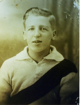 A bust of a young man in a Dayesford football jumper