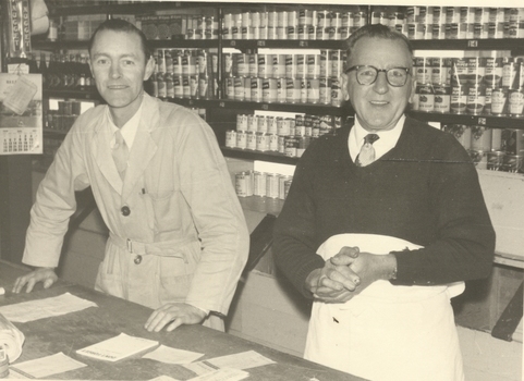 Two men in a grocery store