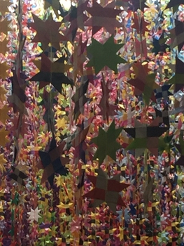 Origami stars hanging from strands