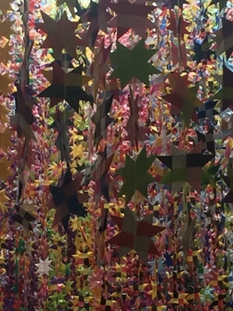 Origami stars hanging from strands