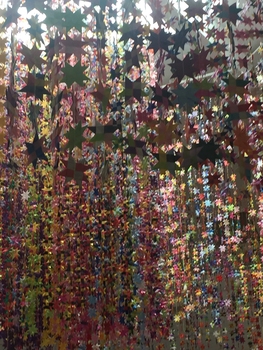 Origami stars hanging from strands