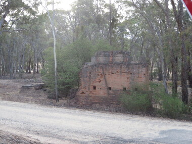 Brck remnants along a road