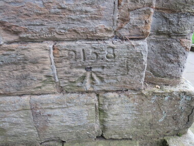Digital Photograph, Stonemason's mark, exterior wall, Durham Cathedral, UK, 21 October 2016