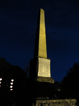 A memorial lit by dawn light