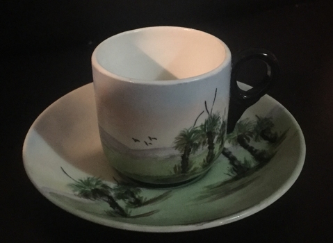 hand painted cup and saucer