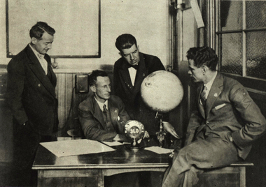 Image, Charles Kingford Smith and C.T.P. Ulm discuss making a flight to New Zealand