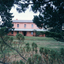 Double stoey house in a garden