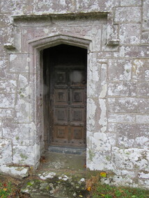 Photograph - Colour, Doorway with stonemason  marks above, Alwington Church, Devon, England