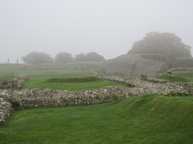 Photograph - Colour, Looking from Stonework towards people walking on earth mounds, Old Sarum, England, English Heritage Site, 2016, 01 November 2016