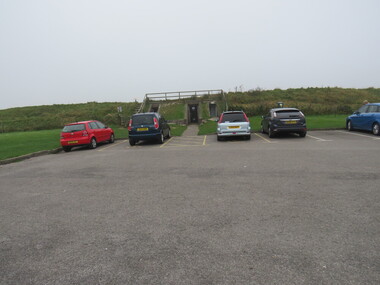 Photograph - Colour, Entrance to Public toilets hidden in earth mound, Old Sarum, England, English Heritage Site, 2016, 01 November 2016