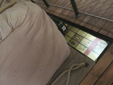 Photograph - Colour, Cutty Sark exhibition, Greenwich, England, showing wool bales from Australia, looking through to lower deck, 2016, 6 November 2016