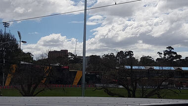 Digital photograph, Lisa Gervasoni, Punt Road Oval from the train - go tigers, 2017