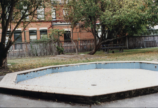 Digital photograph of a octagonal baby pool (swimming) at the  Ballarat Female Refuge.  It pool has dark tiles on outside.