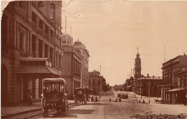 A street with parked vintage cars