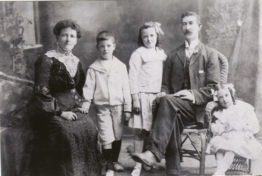 A man, woman and three children